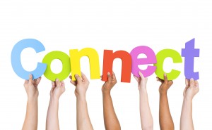 Multi-Ethnic Group Of Diverse People Holding Connect